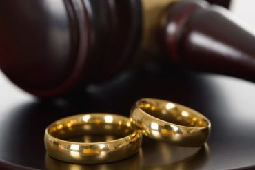 wedding bands and a gavel