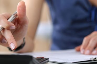 close up of female making calculations